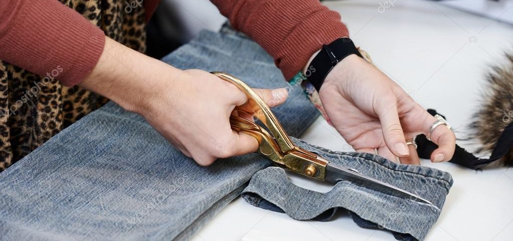 depositphotos_57659341-stock-photo-female-tailor-hands-at-work